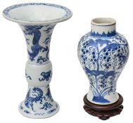 A Chinese blue and white porcelain Gu shaped vase and another (2)