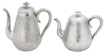 A Victorian silver tea pot and coffee pot