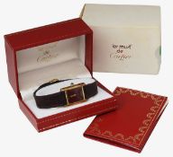 Must de Cartier. A lady's gold plated silver tank wristwatch