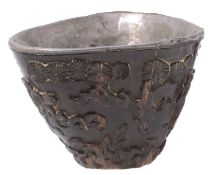 A 19th century Chinese carved hardwood libation cup