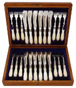A late Victorian cased set of twelve mother of pearl handled electroplated fish knives and forks
