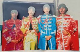 The Beatles Corgi Toys card display and small Sgt Pepper Display standee CD issue