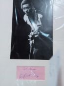 Chuck Berry signature mounted with black and white photograph