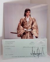 Michael Jackson signed Cheque No 2391 to John McClain dated 09/17/2001 with photograph