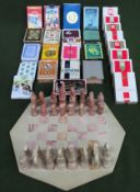 Vintage soapstone type chess set with board, plus quantity of various playing cards all used and