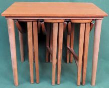 1970's style teak nest of four tables. Approx. 53 x 62 x 42cm Reasonable used condition, scuffs