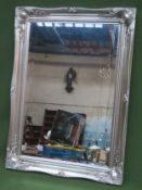 20th century silver coloured framed bevelled wall mirror. Approx. 65 x 91cms reasonable used with