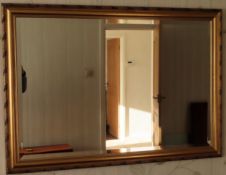 20th century gilded and bevelled wall mirror. Approx. 72 x 102cm Reasonable used condition