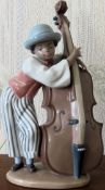 Lladro glazed ceramic figure - Jazz band Bass player (No. 5834). Approx. 22cms H