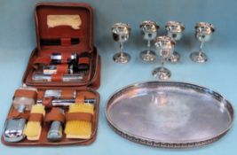 Parcel of silver plated ware including serving tray, two grooming sets, goblets All in used