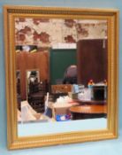20th century gilded and bevelled wall mirror. Approx. 60 x 70cms reasonable used condition