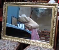 20th century gilded and beveleed wall mirror. Approx. 60cms x 83cms reasonable used condition