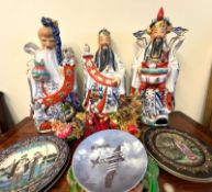 THREE CHINESE POTTERY FIGURES, TWO SNAKE FIGURES, FIVE BRADEX PLATES, PLUS COMPOSITION WALL PLAQUE