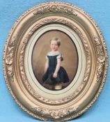 Victorian gilded oval portrait picture of a young girl. 27 x 24cm