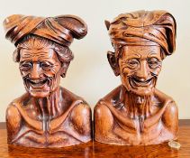 PAIR OF INDONESIAN HARDWOOD BUSTS WITH SMILING FACES, APPROX 27cm HIGH