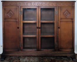 Oak priory style display cabinet. Approx. 100cm H x 125cm W x 31cm D Used condition, scuffs and