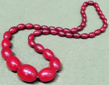 Large vintage strand of graduated Cherry Amber beads. Weight approx. 55.7g Reasonable used condition