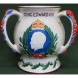 Edward VIII ceramic three handled loving cup. Approx. 22cms H musical section deficient. crazing