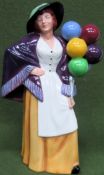 Royal Doulton glazed ceramic figure - Balloon Lady. HN2935 reasonable used condition