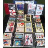 Nine albums containing various modern postcards All in used condition, unchecked