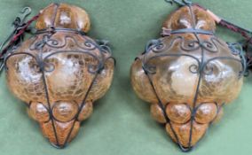 Pair of vintage metal framed and Citrine coloured crackle glaze glass hanging light fittings.