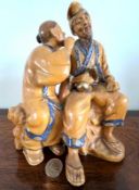 JAPANESE POTTERY FIGURE GROUP OCHRE GLAZE, EARLY 20th CENTURY