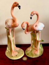 TWO EXAMPLES OF CERAMIC FLAMINGOS, ROYAL BELVEDERE CHINA, APPROX 23cm HIGH AND 28cm LENGTH