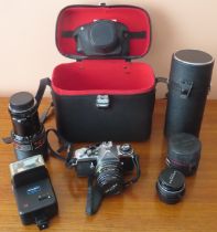 Cased Pentax "ME" camera, plus accesories including lenses etc All in used condition, not tested for
