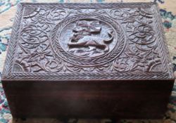 Heavily carved sectional storage box. Approx. 15cm H x 36cm W x 25cm D Used condition, scuffs and