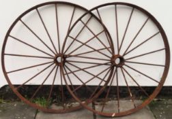 Pair of large vintage wagon wheels. Approx. 113cm Diameter Both in used condition, evidence of