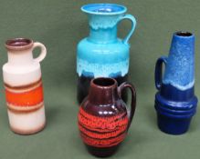 Four vintage West German glazed pottery jugs. Largest Approx. 25.5cms H all reasonable used
