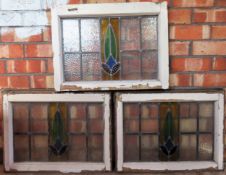 Three small leaded stained glass and wooden framed windows. Approx. 44 x 60cm All in used condition,