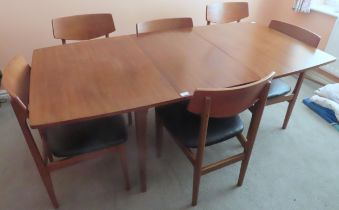 Nathan mid 20th century teak extending dining table with one leaf, plus six chairs. Table Approx.