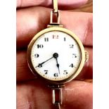 9ct GOLD LADIES WRISTWATCH AND STRAP, SET WITH FIFTEEN JEWELS, APPROX TOTAL WEIGHT 16.3g