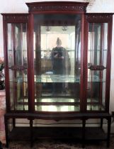 Art Nouveau mahogany bow fronted single door display cabinet. Approx. 182cm H x 140cm W x 49cm D