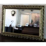20th century gilded piercework wall mirror. Approx. 35 x 67cm Reasonable used condition