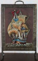 Early 20th century brass firescreen with relief decorated galleon. Approx. 62cm H Reasonable used
