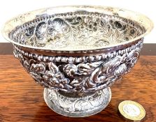 INDIAN WHITE METAL BOWL UPON RAISED FOOT, APPROX WEIGHT 120g. APPROX. 8CM HIGH & DIAMETER 12.5cm