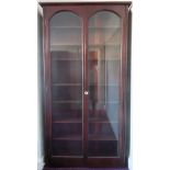 Large 20th century mahogany two door bevelled and glazed bookcase. Approx. 220cm H x 115cm W x