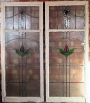 Pair of old leaded stain glass and wooden framed panels. Approx. 135 x 57cm All in used condition,