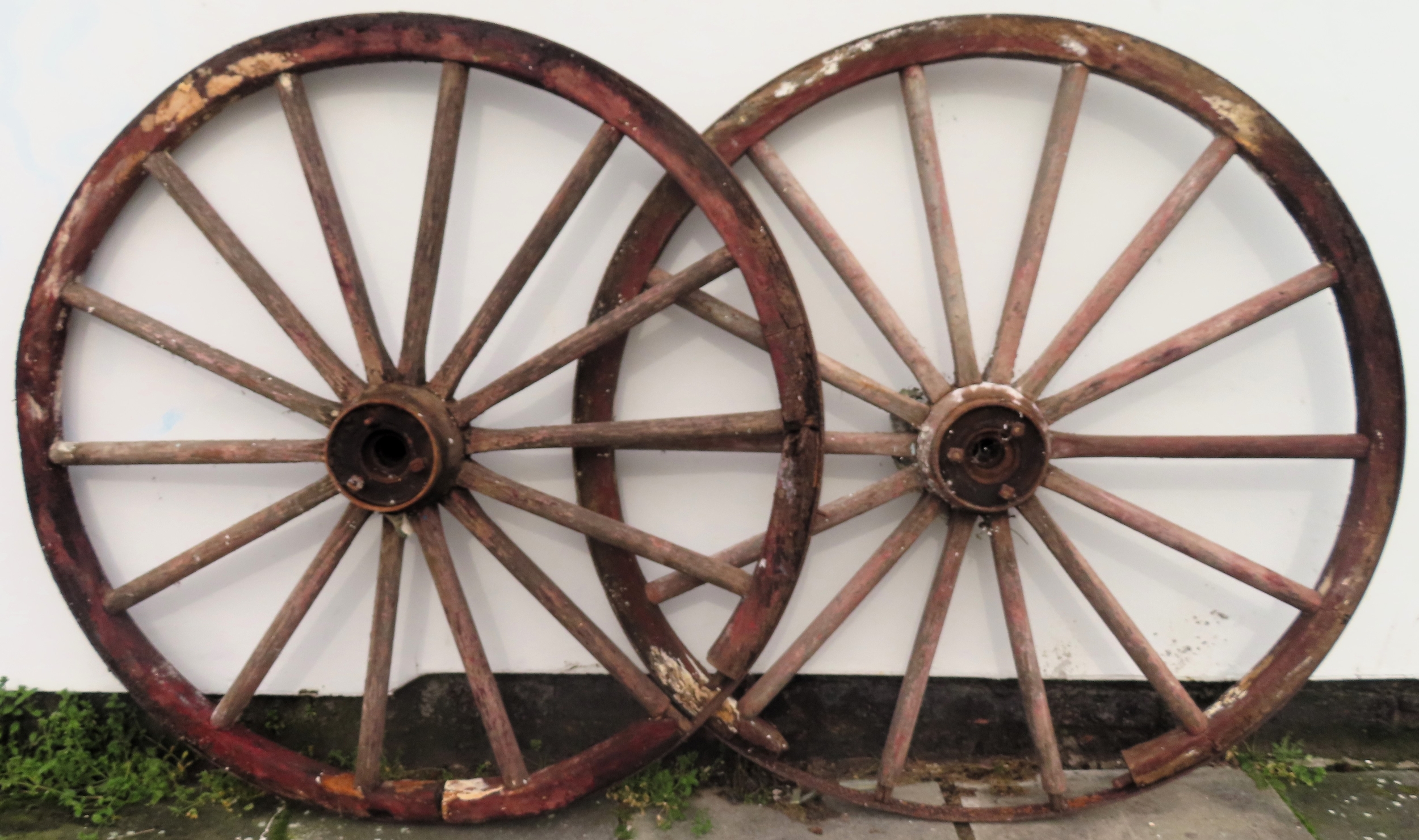 Pair of large vintage wagon wheels. Approx. 145cm Diameter Both in used condition, for