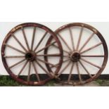 Pair of large vintage wagon wheels. Approx. 145cm Diameter Both in used condition, for