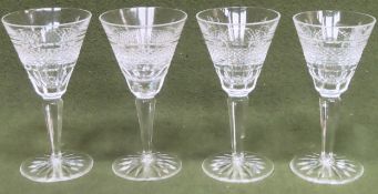 Four Waterford "Rossmore" stemmed drinking glasses. Approx. 16.5cm H