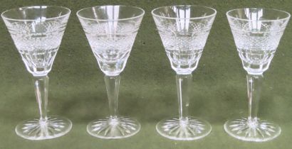 Four Waterford "Rossmore" stemmed drinking glasses. Approx. 16.5cm H