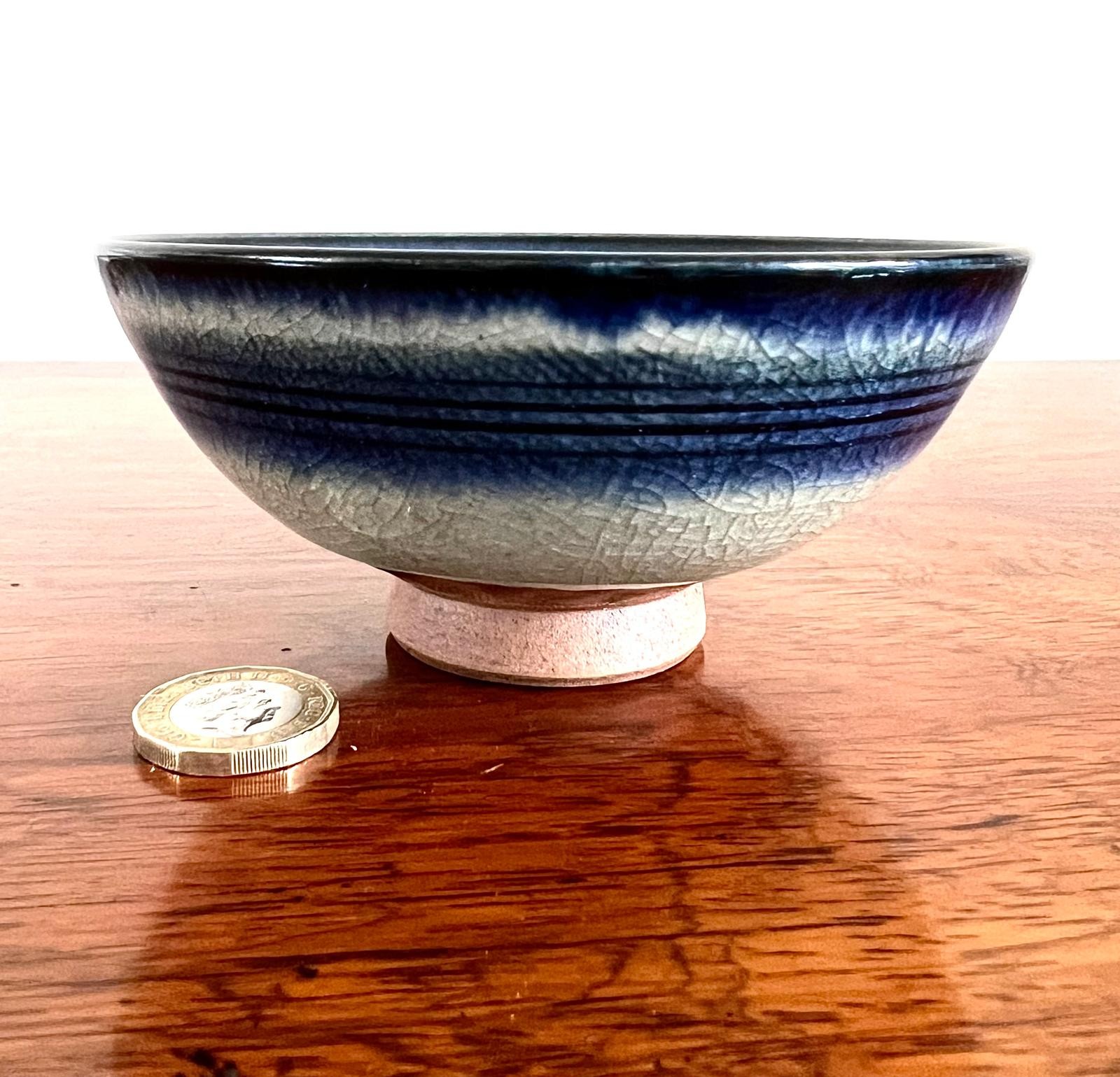 SMALL JAPANESE POTTERY BOWL ON RAISED FOOT, SIGNATURE TO BASE, CRACKLE GLAZE, DIAMETER APPROX 12cm