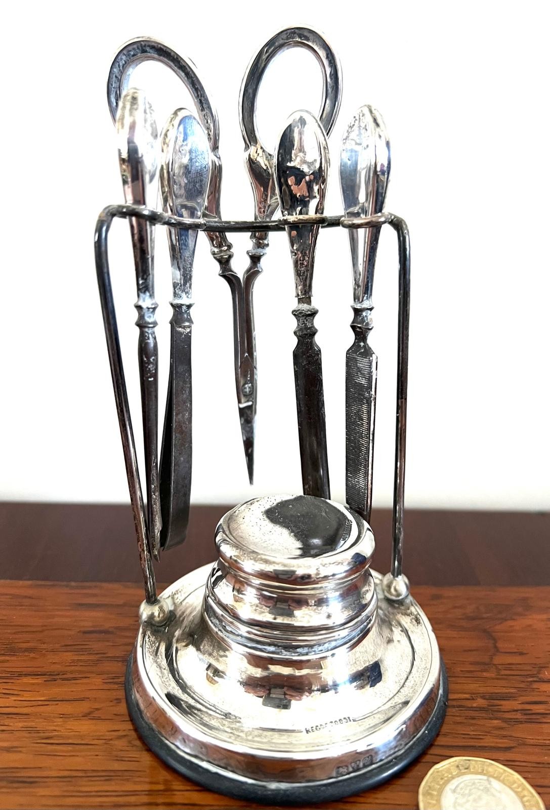 SILVER MANICURE SET, CHESTER HALLMARK, 1920, SIX PIECE UPON CIRCULAR STAND