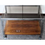 Howard Miller style glass topped chrome side/coffee table. Approx. 40cm H x 61cm W x 42cm D
