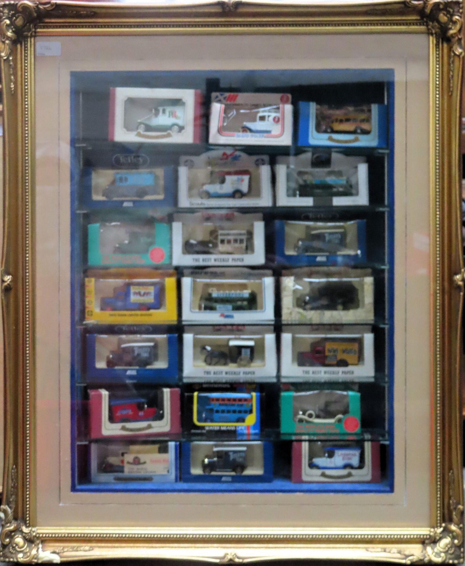 20th century picture frame form glazed display case containing diecast vehicles