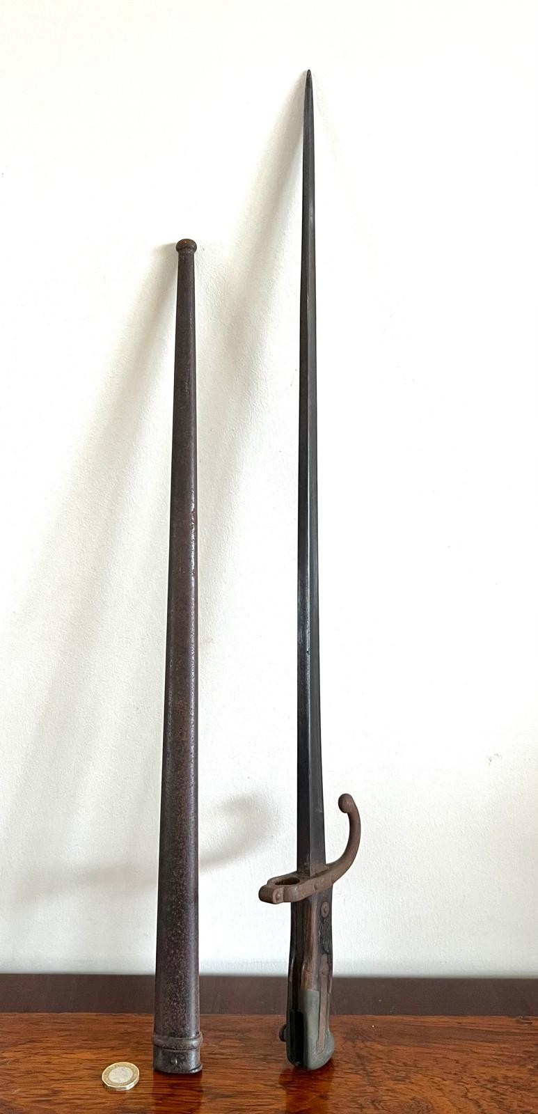 BAYONET AND SCABBARD, APPROX 66cm LONG IN SCABBARD