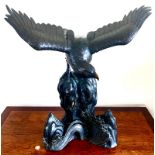 19TH CENTURY IMPRESSIVE JAPANESE BRONZE EAGLE CENSER ON BRONZE ROCKS AMIDST STYLISTIC BREAKING WAVE